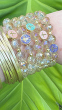 Load and play video in Gallery viewer, Aurora Borealis Cross Saint Benedict Crystal Bracelet