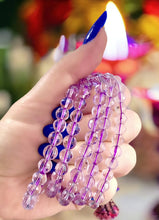 Load and play video in Gallery viewer, Faceted Amethyst Blessed Beaded Bracelets